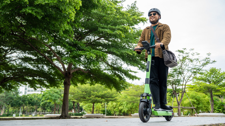 Person riding electric scooter.