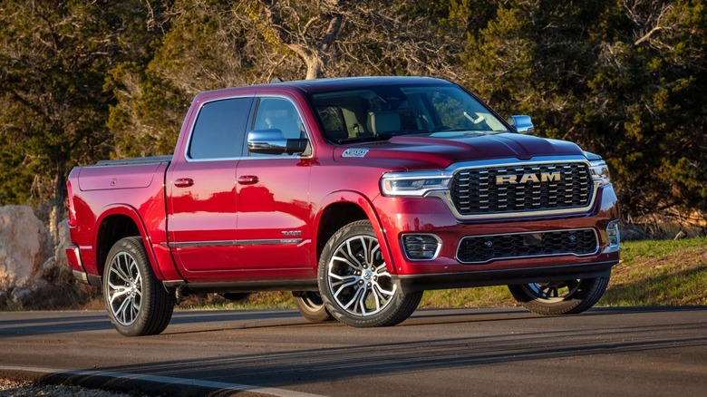 2025 Ram 1500 Tungsten parked on a road with trees in the background