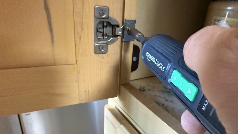 Amazon Basics Rechargeable Cordless Stick Screwdriver in use