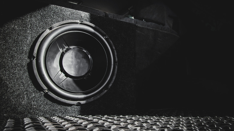 Car subwoofer fitted in car interior