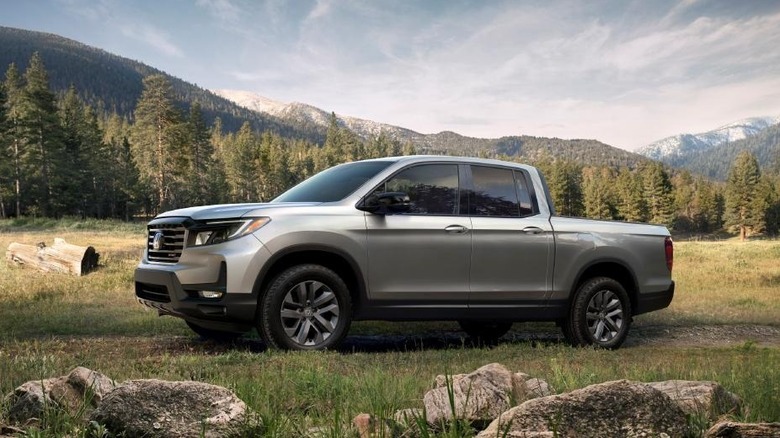2022 Honda Ridgeline parked in a mountain meadow