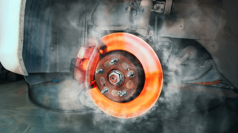 Overheated brake rotor with red-hot disc and smoke effects
