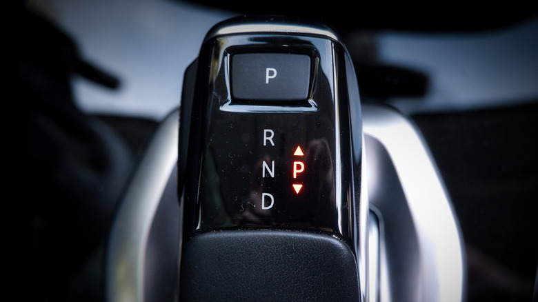 Close up of electronic gear shift controls.