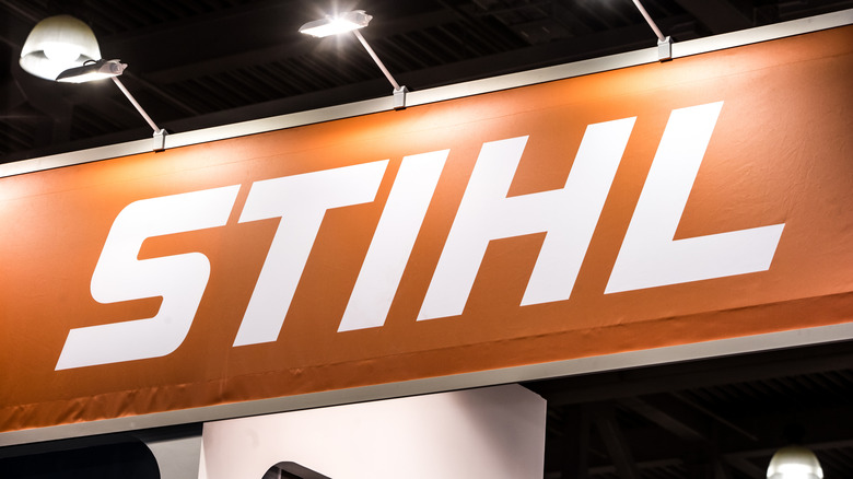 A giant illuminated sign with Stihl logo