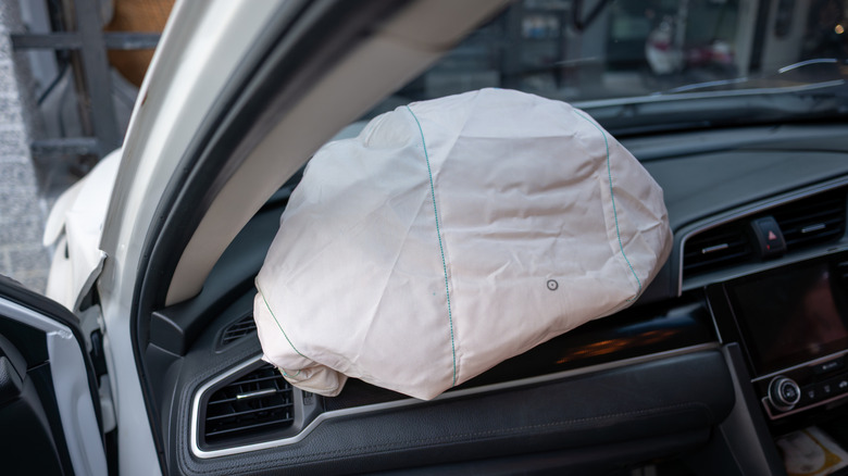 Close-up of a deployed airbag inside a vehicle
