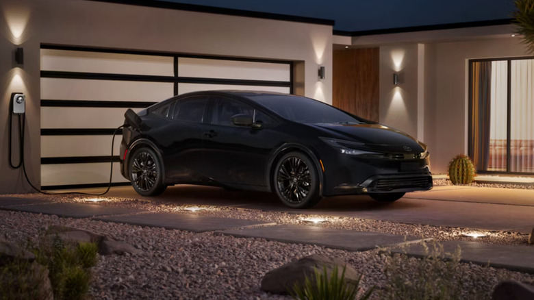 Toyota Prius charging in driveway
