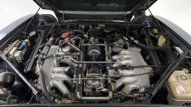 Jaguar XJS V12 engine bay on white background