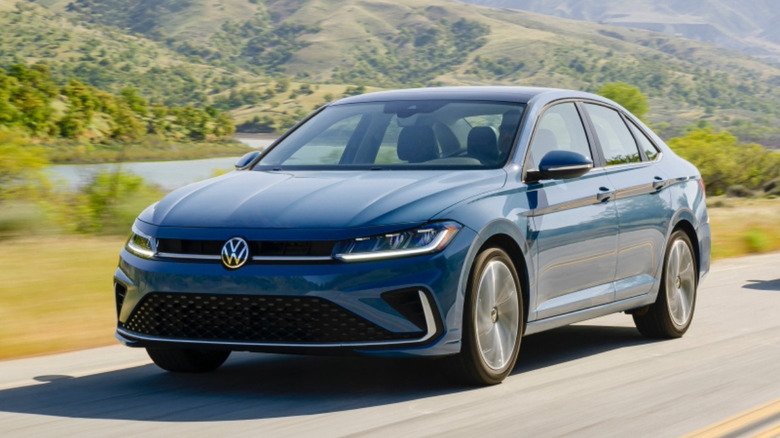 A blue 2027 Volkswagen Jetta on the road