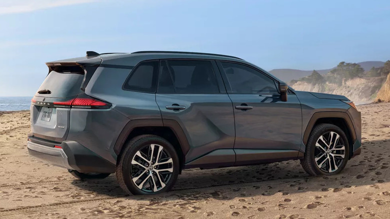 A gray 2026 Toyota RAV4 parked on a sandy beach