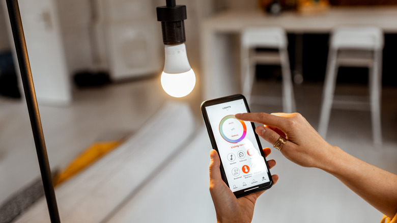 A smart bulb being controlled via a smartphone