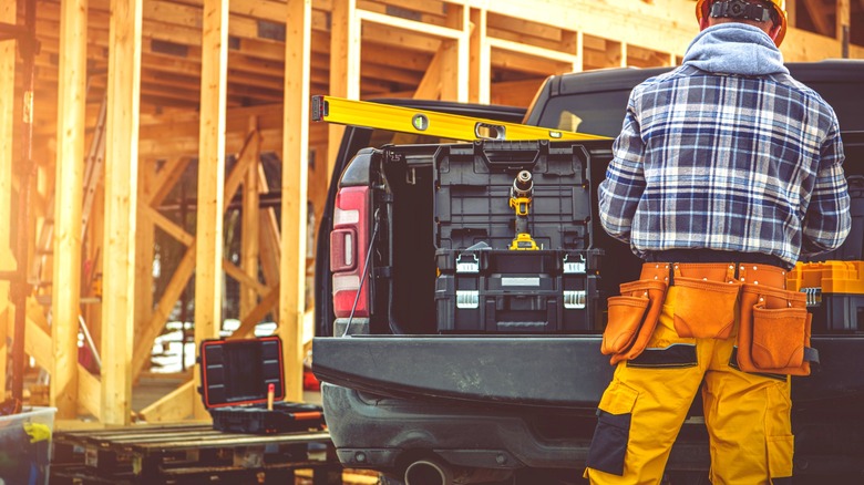 DeWalt's Tough System 2.0 DS450 Mobile Tool Box on a muddy jobsite.