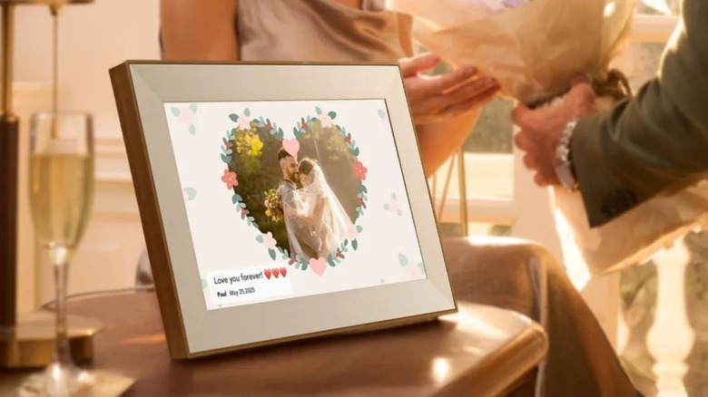 A Pexar frame displaying wedding photos.