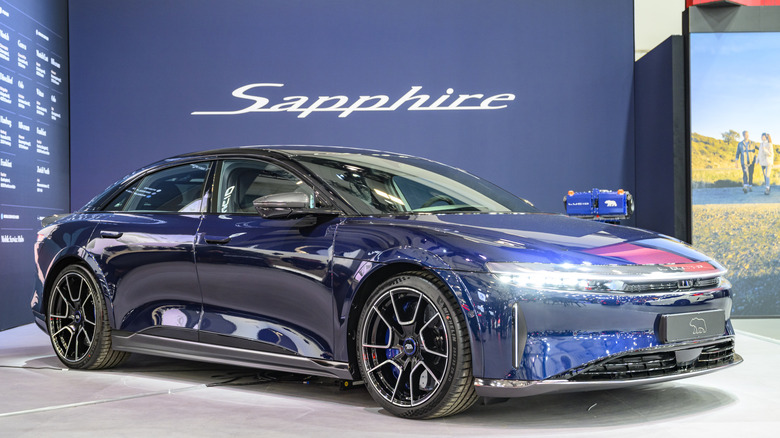 A blue Lucid Air Sapphire in a showroom