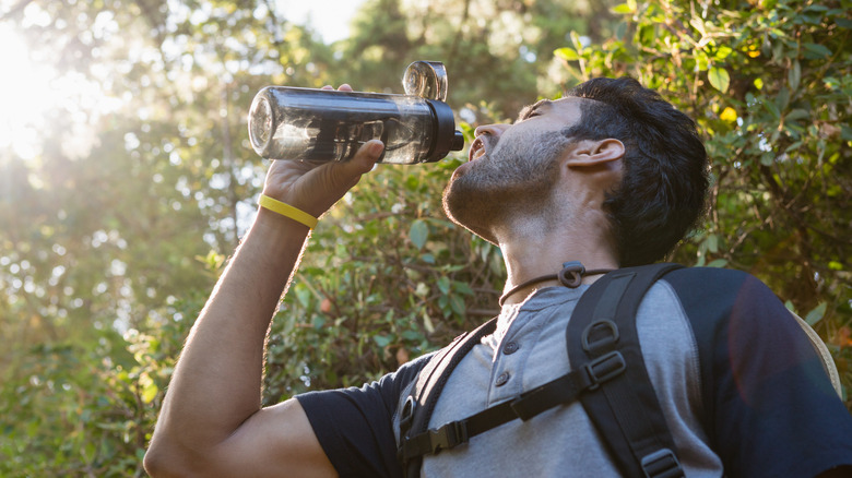 Man drinks water