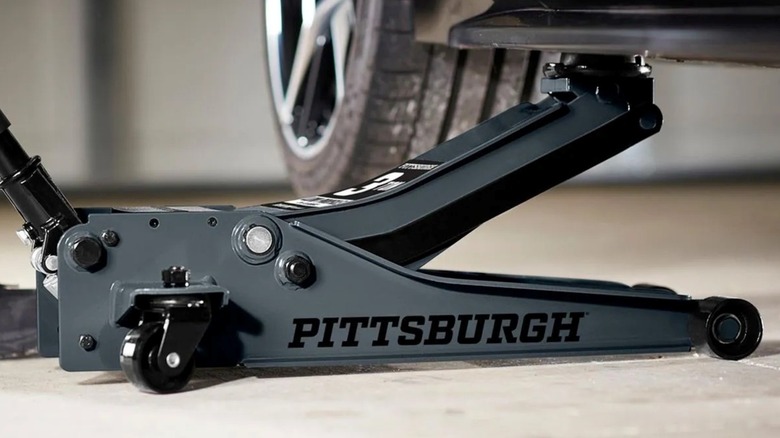 Using the Pittsburgh floor jack from Harbor Freight to lift a car.