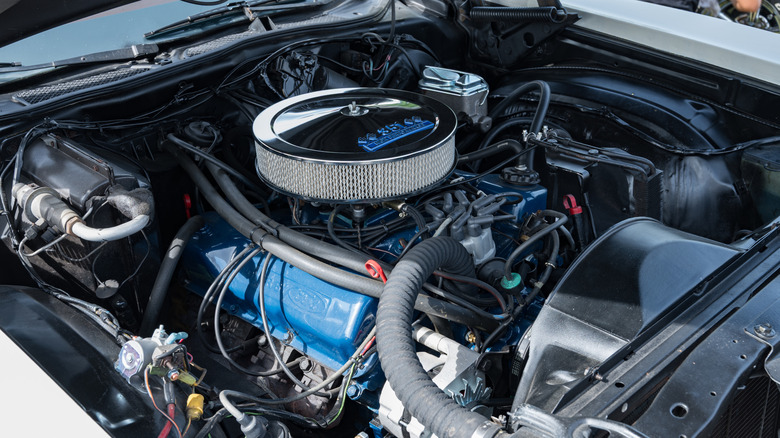 A close-up of a Ford 351 V8 engine in a Grand Torino engine bay.