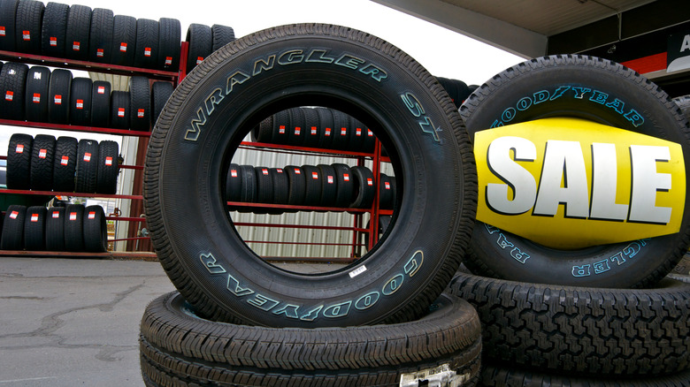 Goodyear tires on display in a store.