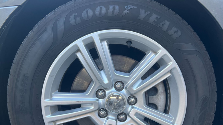 Goodyear Assurance MaxLife tire on a vehicle.