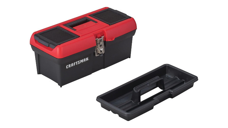 A plastic red and black Craftsman tool box next to a tool box tray.