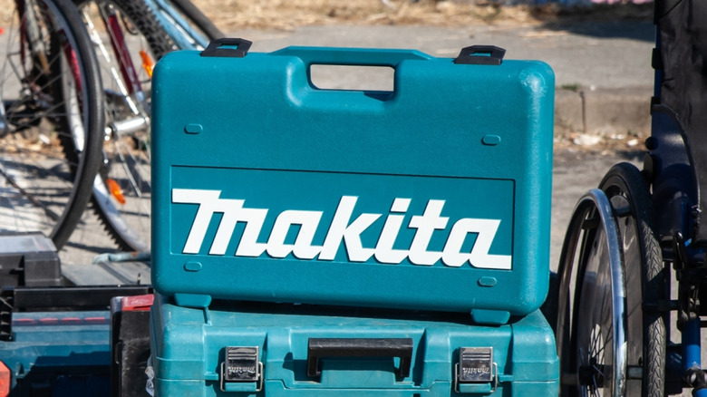 A Makita tool case outside.