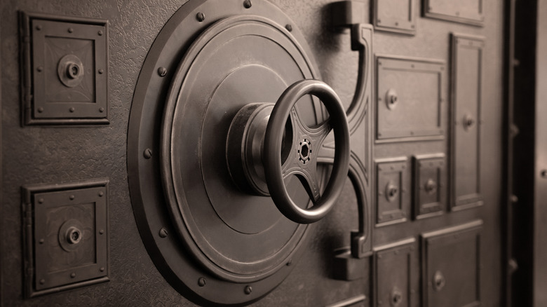 A closeup of a bank vault door.