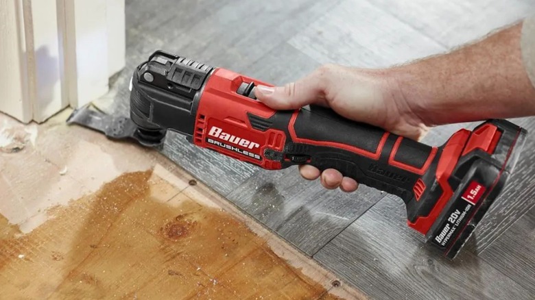 20V Cordless Variable-Speed Oscillating Multi-Tool in use