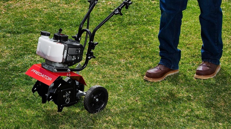 Predator cultivator being rolled across a lawn
