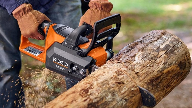 cutting log with Ridgid chainsaw