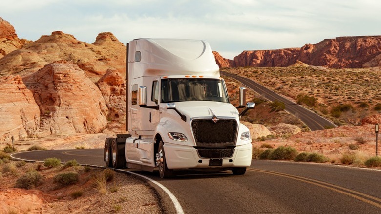 White International LT semi-truck on a desert road