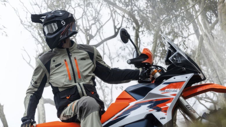 KTM 890 Adventure R static with rider sitting on top
