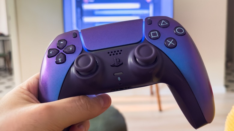 Close-up of a purple Sony PlayStation 5 DualSense wireless controller