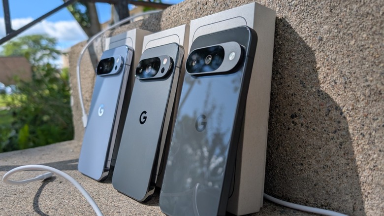 Google Pixel 10 phones leaning against against concrete