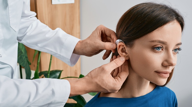 Woman with hearing aid