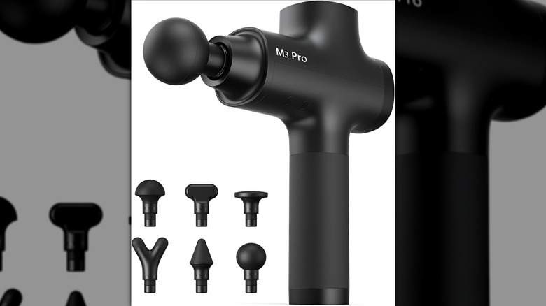 Opove massage gun and replacement heads on white background