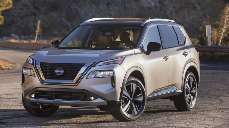 Gold 2022 Nissan Rogue parked on tarmac
