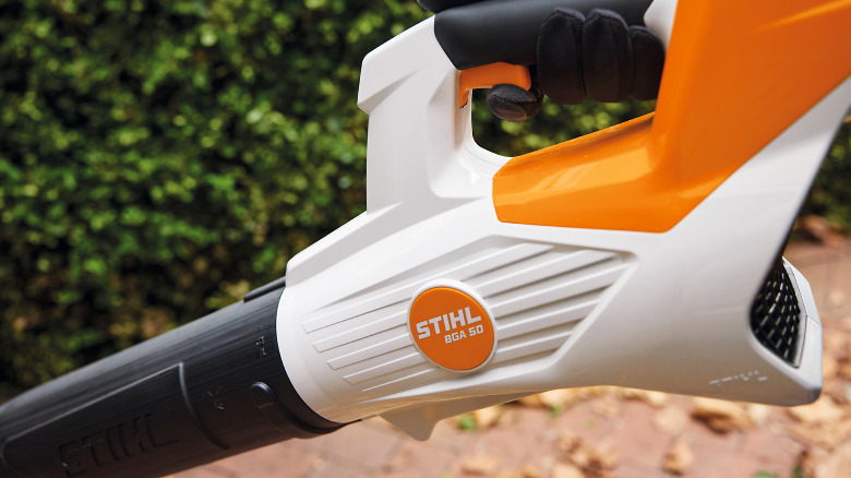 A closeup of the Stihl logo on a leaf blower.
