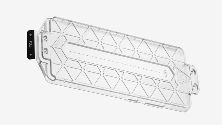 A Dbrand Prism screen protector inside the application kit