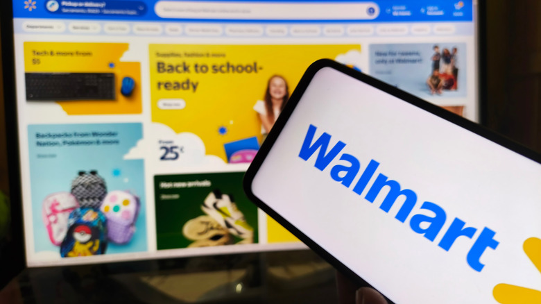 The mobile device displays the Walmart brand and logo with a desktop monitor