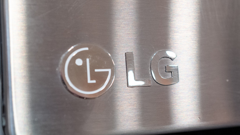 Close-up of the LG logo on a silver appliance