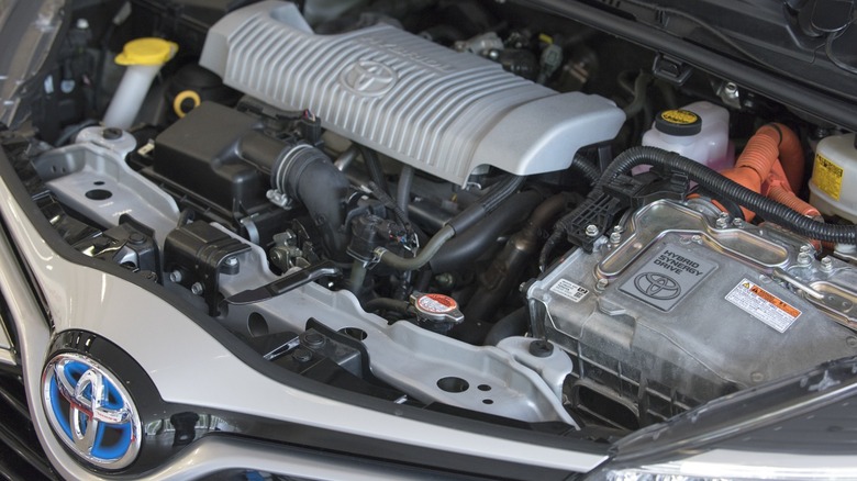 A Toyota car with its engine bay open