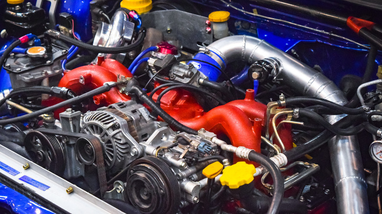 A close-up of a tuned turbocharged early EJ20 Subaru engine.