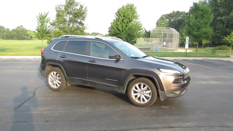 A gray 2016 Jeep Cherokee parked