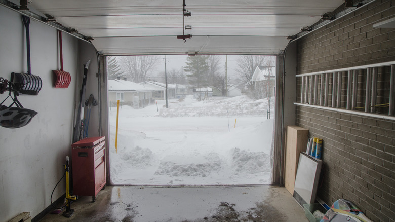 View showing snow outside of a garage door