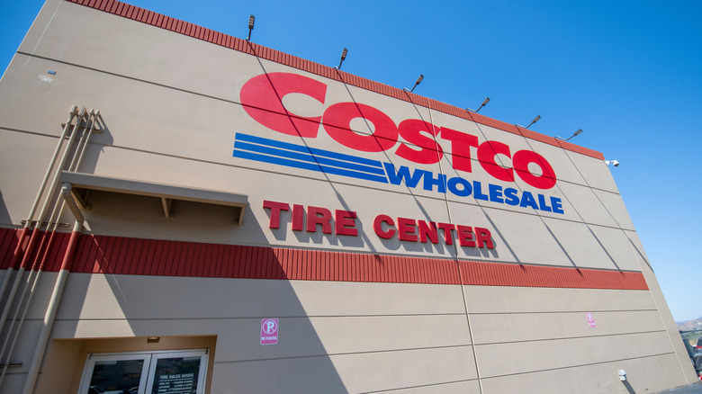 Costco Wholesale Tire Center red logo, sign, marquess side of building.