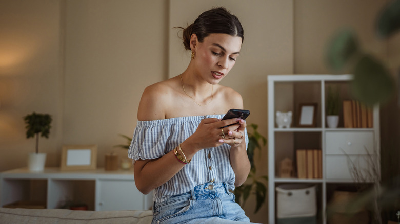 Woman looking at her phone