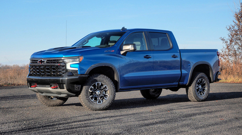A blue Chevrolet Silverado ZR2 parked outside on gravel