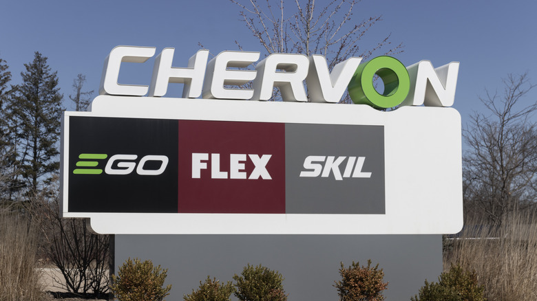 Chervon headquarters sign with the Ego, Flex, and Skil logos beneath it