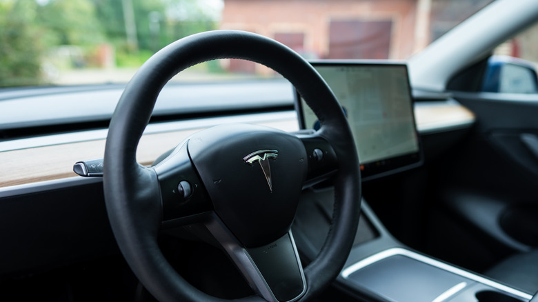 The steering wheel of a Tesla vehicle