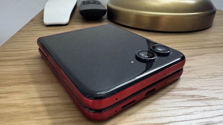 A Motorola Razr Ultra 2025 folded up and not in use on a nightstand