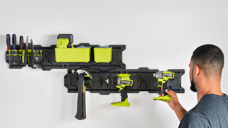 A person accessing Ryobi wall rails